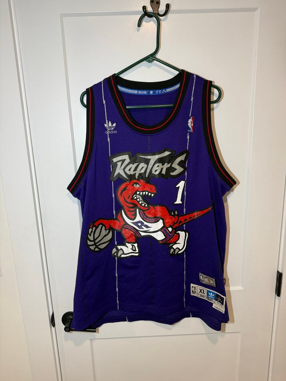 Mitchell & Ness Tracy McGrady Toronto Raptors Retro NBA L Jersey.